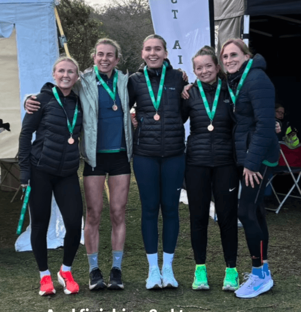 Tipton Harriers Endurance women's team celebrate their bronze medal at the 2026 Midland Counties Road Relays